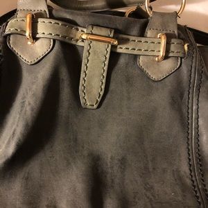 A crossbody/Satchel purse . A deep gray